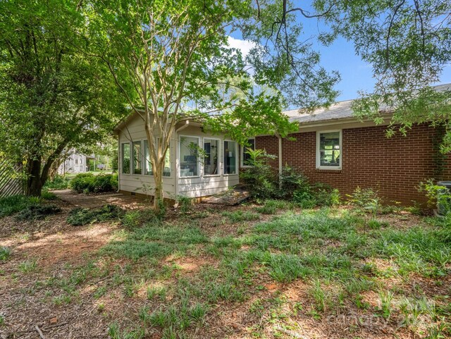 1737 Whitesides Rd, Forest City, NC 28043 - view of front of property with a sunroom and brick siding