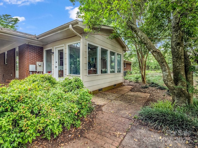 1737 Whitesides Rd, Forest City, NC 28043 - view of home's exterior with crawl space and a sunroom