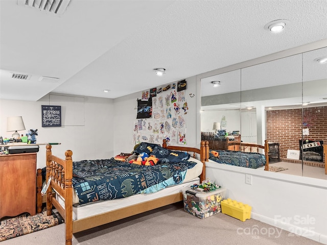 1737 Whitesides Rd, Forest City, NC 28043 - carpeted bedroom featuring a textured ceiling