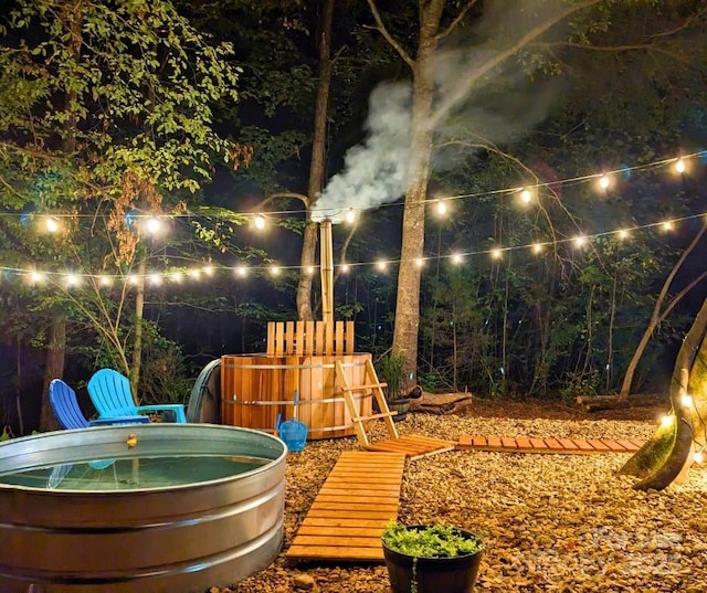 1737 Whitesides Rd, Forest City, NC 28043 - yard at night with a jacuzzi
