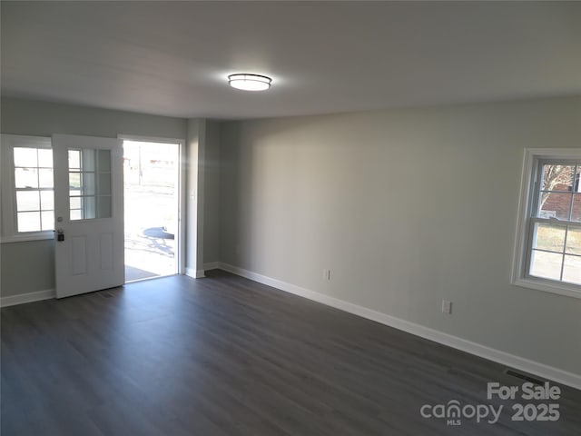 interior space with dark wood-type flooring