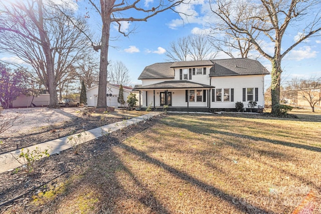 view of front facade with a porch and a front lawn