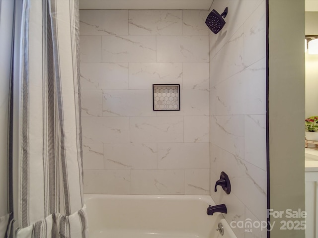 bathroom with shower / bath combo