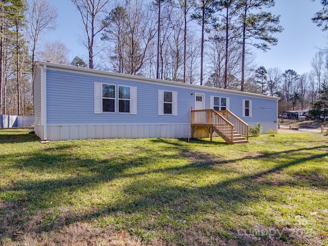 view of front of home with a front lawn