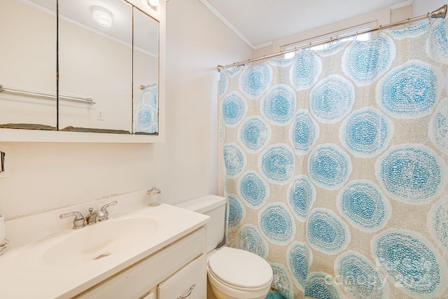 bathroom featuring a shower with curtain, toilet, vanity, and ornamental molding