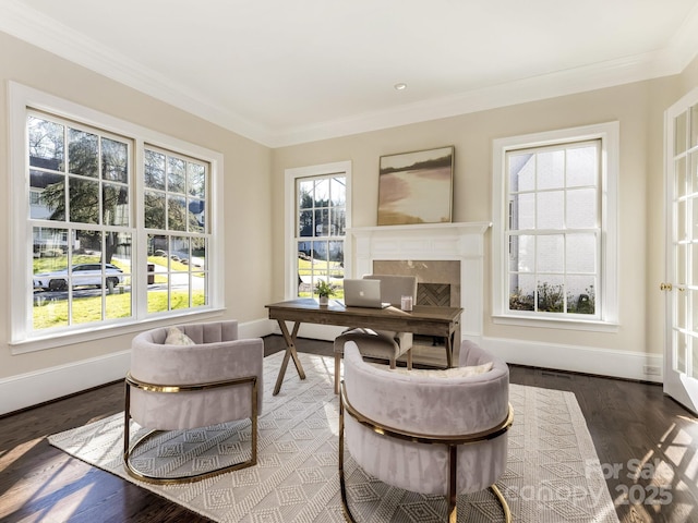 sunroom / solarium featuring a fireplace