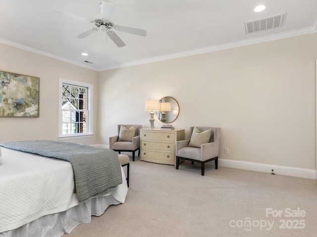 carpeted bedroom featuring ceiling fan and ornamental molding