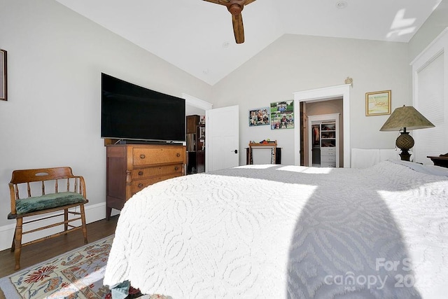 bedroom featuring lofted ceiling, dark hardwood / wood-style floors, and ceiling fan