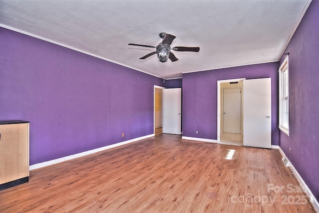 unfurnished bedroom with ceiling fan and hardwood / wood-style flooring