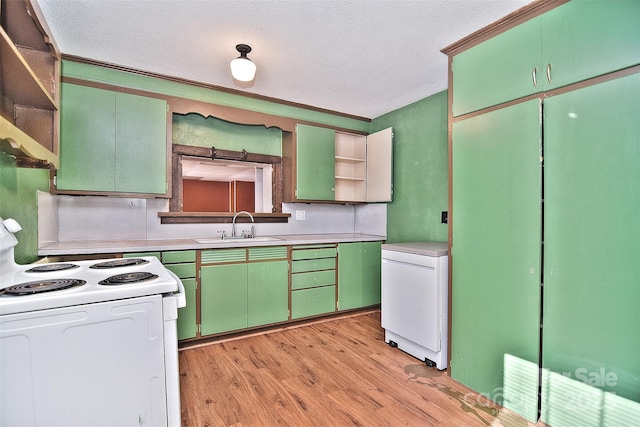 kitchen with sink, fridge, a textured ceiling, light hardwood / wood-style floors, and white electric range