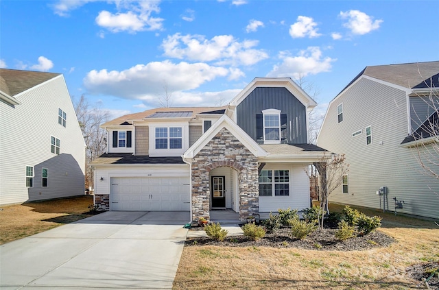 view of front of home with a garage