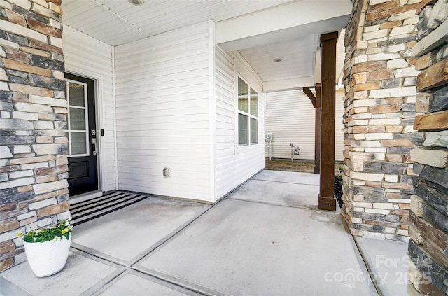 property entrance with a porch