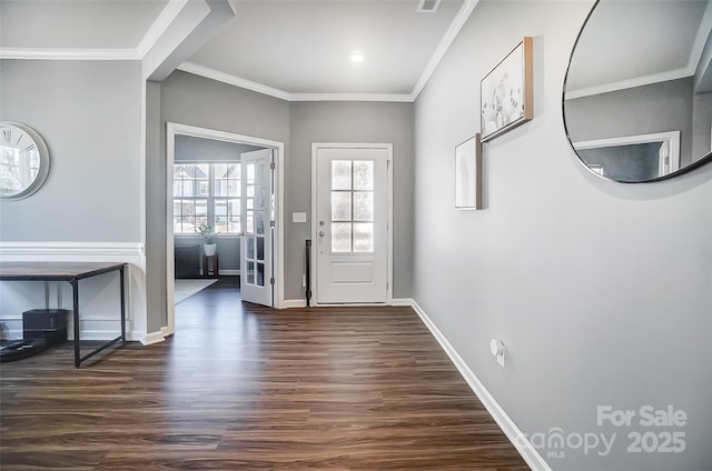 doorway featuring crown molding and dark hardwood / wood-style flooring