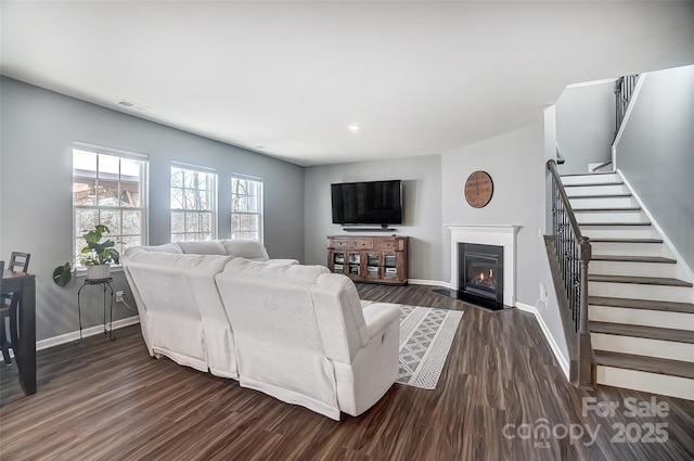 living room featuring dark hardwood / wood-style flooring