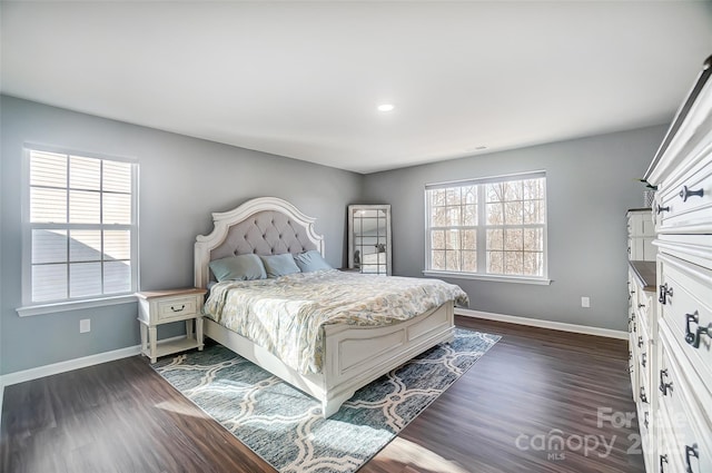 bedroom featuring dark hardwood / wood-style floors