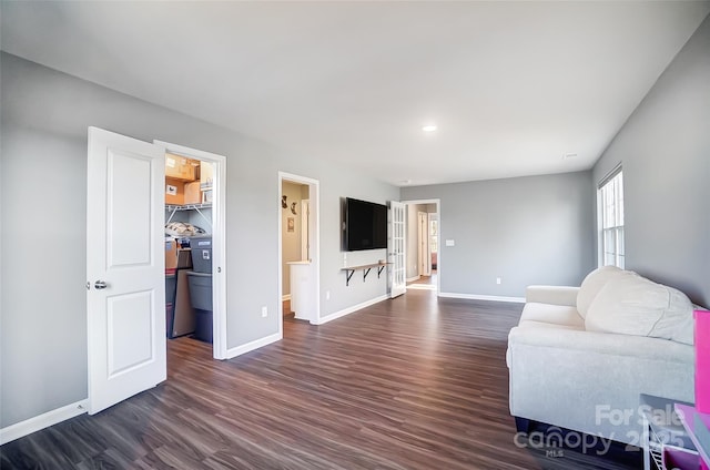 living room with dark wood-type flooring