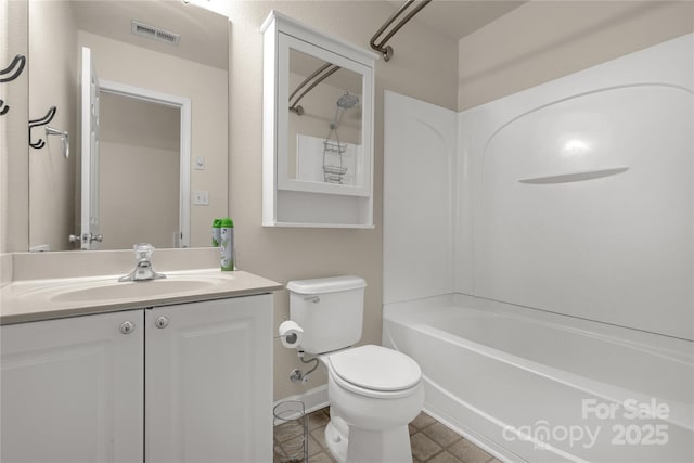 full bathroom with shower / bathing tub combination, vanity, and toilet