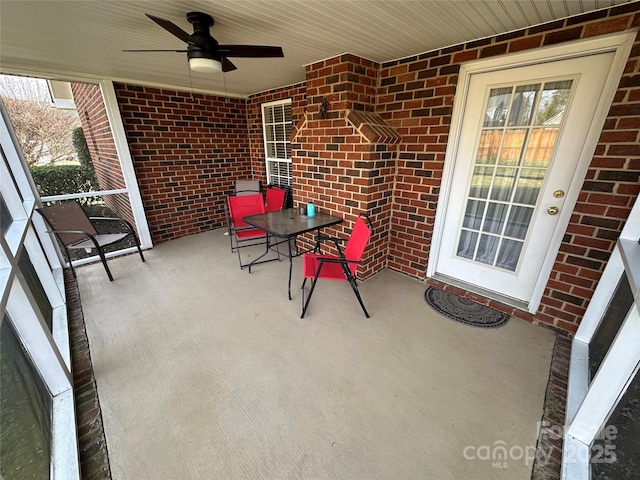 view of patio / terrace featuring ceiling fan