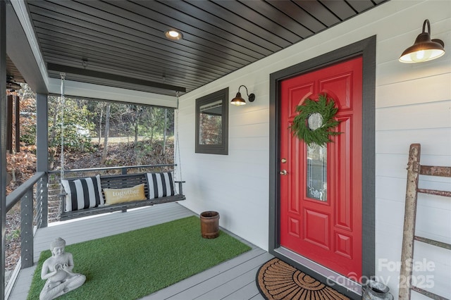 property entrance with a porch