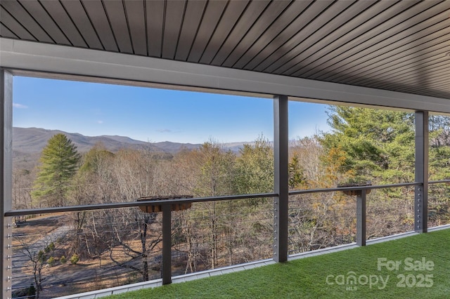 exterior space featuring a mountain view