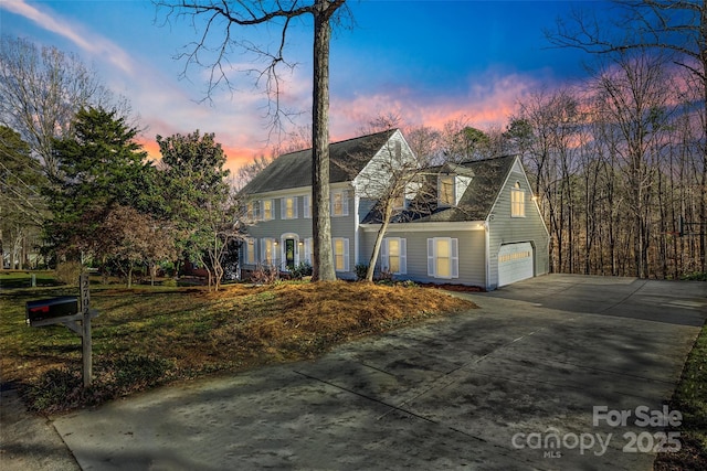 view of front of home with a garage