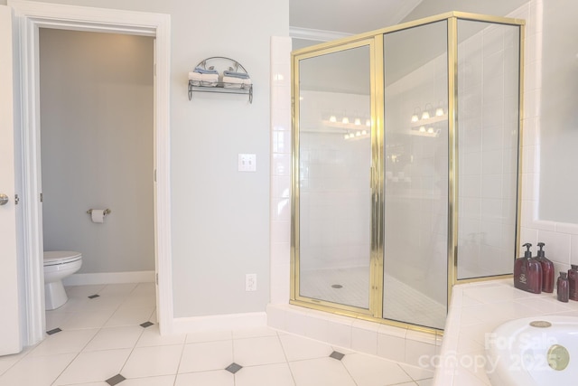 bathroom featuring tile patterned flooring, an enclosed shower, and toilet