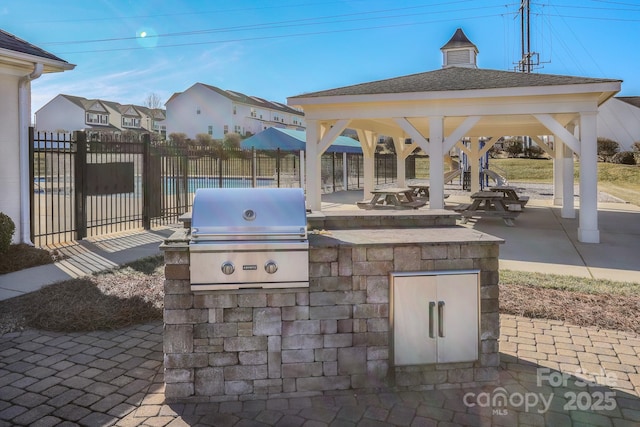 view of patio / terrace featuring area for grilling and a gazebo