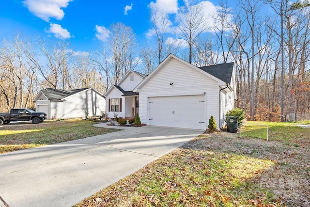 view of front of property with a front lawn and a garage