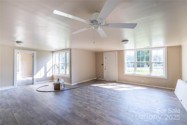 interior space featuring hardwood / wood-style floors and ceiling fan