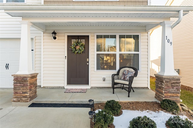 entrance to property with covered porch