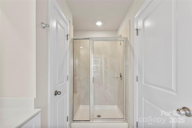 bathroom featuring an enclosed shower