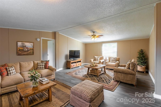 living room with hardwood / wood-style floors, a textured ceiling, ceiling fan, and lofted ceiling