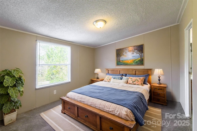 bedroom featuring carpet floors, a textured ceiling, and ornamental molding