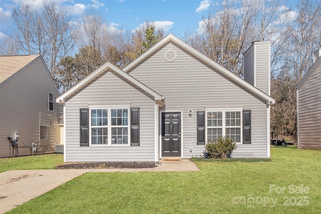 view of front of home featuring a front lawn