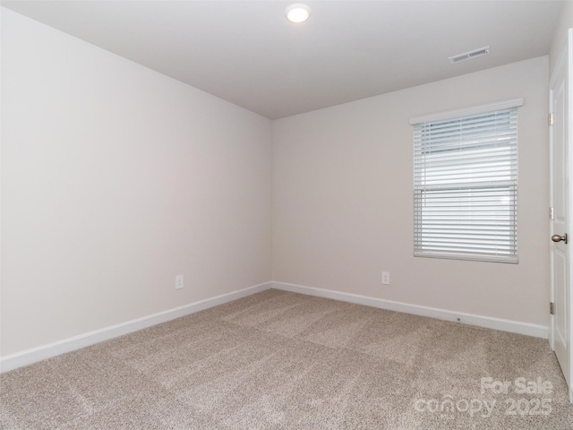 view of carpeted spare room