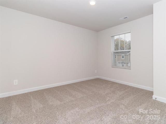 view of carpeted spare room