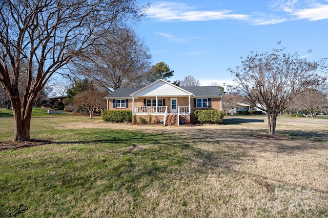 single story home with a porch and a front yard