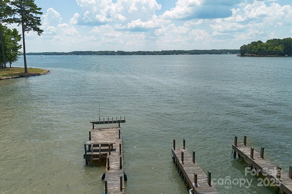 view of dock with a water view