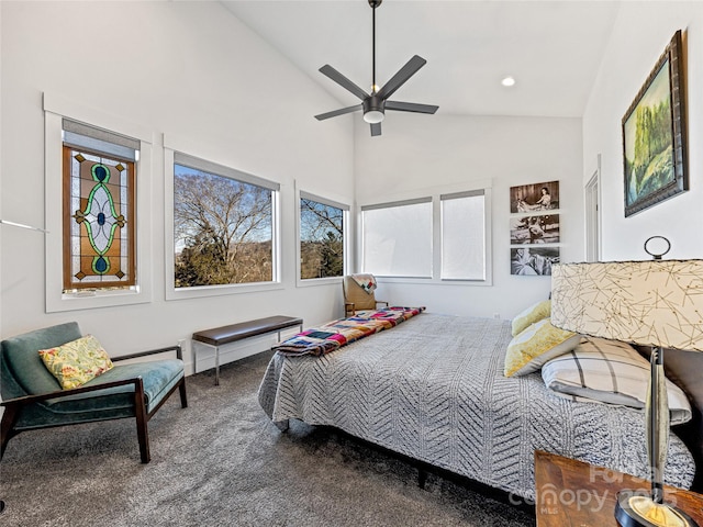 bedroom with carpet floors, vaulted ceiling, and ceiling fan