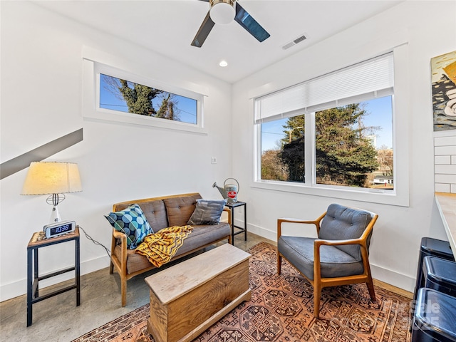 living room with ceiling fan