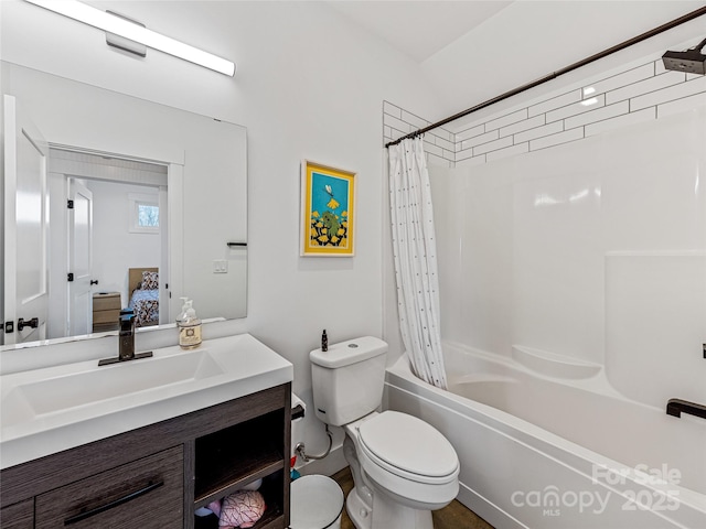 full bathroom with vanity, toilet, and shower / bath combo with shower curtain