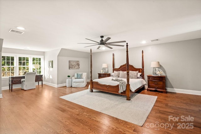 bedroom featuring ceiling fan and hardwood / wood-style flooring