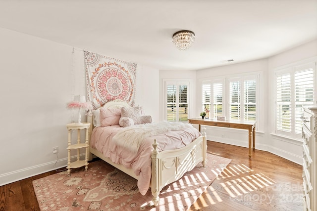 bedroom featuring light wood-type flooring