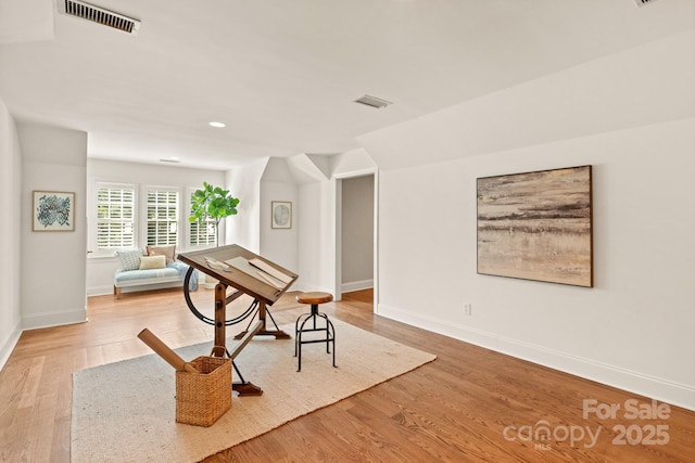 misc room with hardwood / wood-style floors