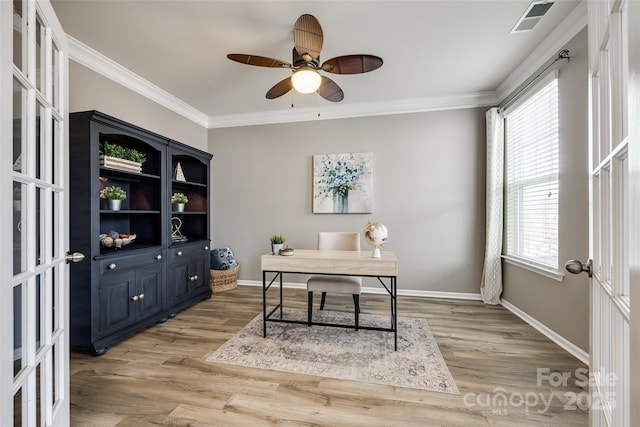 office featuring ornamental molding, light hardwood / wood-style floors, french doors, and ceiling fan