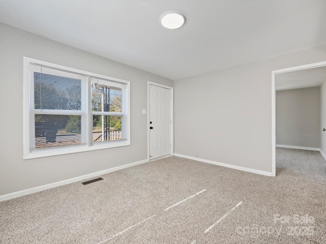 view of carpeted spare room