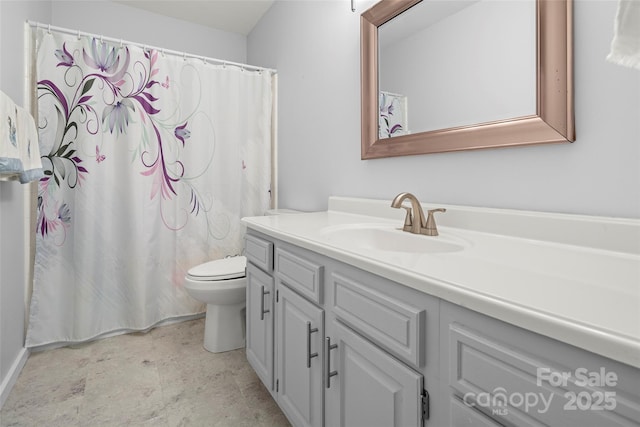 bathroom with walk in shower, vanity, and toilet