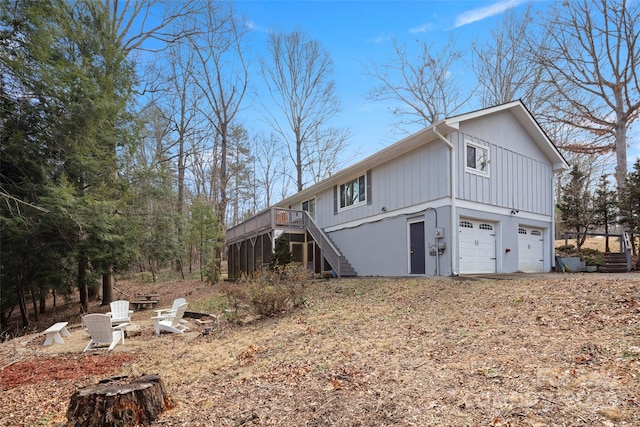 exterior space featuring a garage and a deck