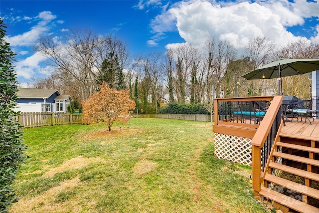 view of yard featuring a deck