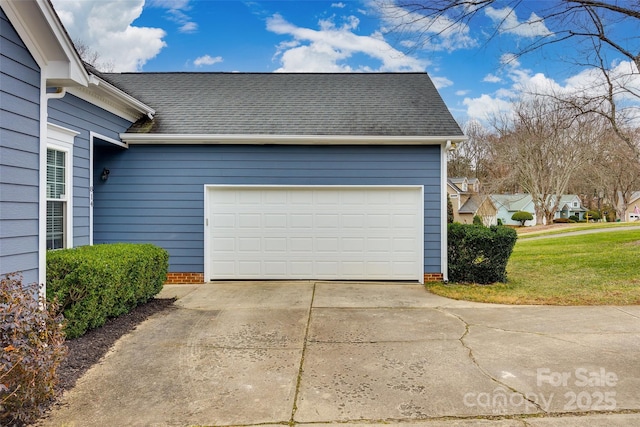 garage featuring a yard